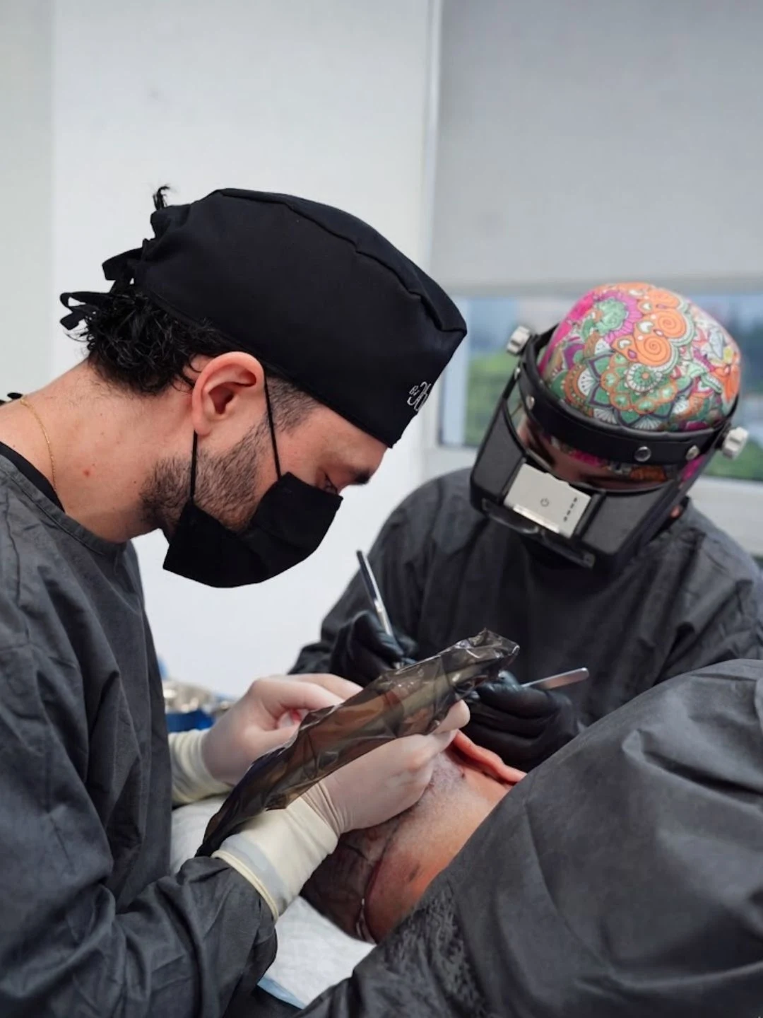 Dharma Hair medical team placing hair grafts during an FUE procedure